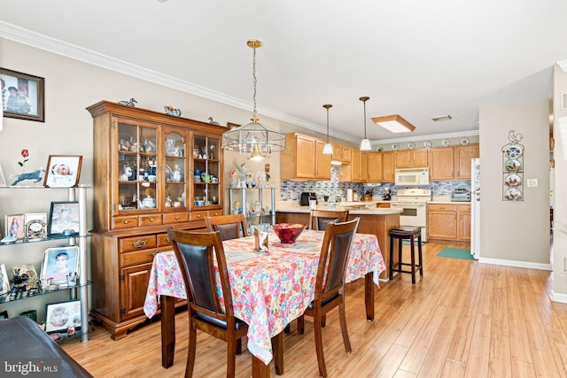 4 Hagarman Dr Unit 4, York, PA 17408 - dining room featuring light wood-style floors, ornamental molding, and baseboards