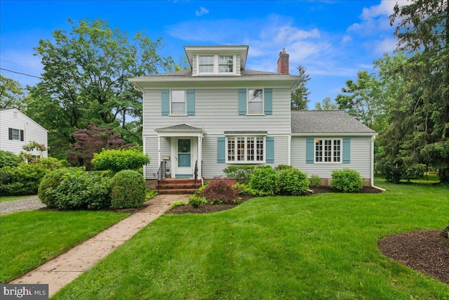 14 Willow Rd, Lawrenceville, NJ 08648 - traditional style home with a chimney, a front yard, and roof with shingles