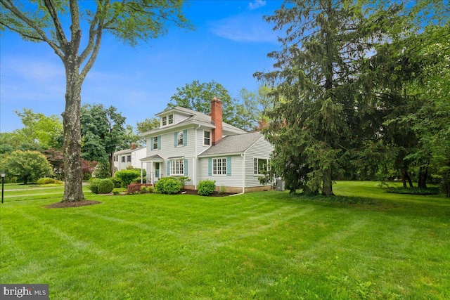 14 Willow Rd, Lawrenceville, NJ 08648 - traditional style home featuring a chimney and a front lawn