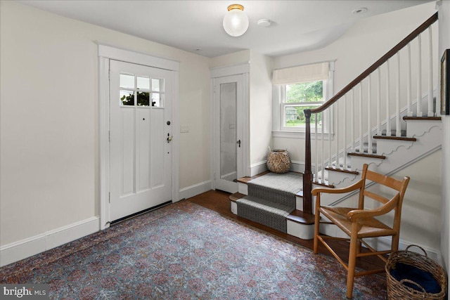 14 Willow Rd, Lawrenceville, NJ 08648 - foyer entrance with stairway, baseboards, and wood finished floors