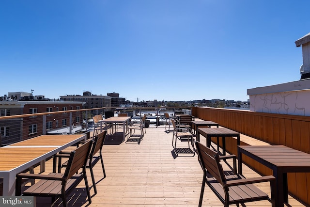1731 Willard St NW Unit 102, Washington, DC 20009 - wooden deck featuring outdoor dining area