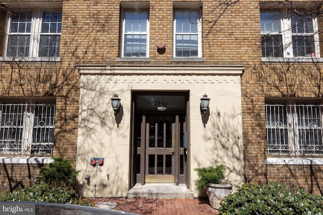 1731 Willard St NW Unit 102, Washington, DC 20009 - doorway to property with brick siding