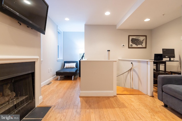 1731 Willard St NW Unit 102, Washington, DC 20009 - living room with wood-type flooring, recessed lighting, and baseboards
