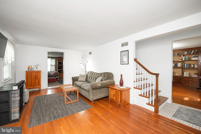 617 March St, Reading, PA 19607 - living room with wood finished floors and stairway