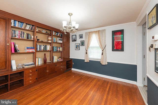 617 March St, Reading, PA 19607 - office with a chandelier, wood finished floors, ornamental molding, and baseboards