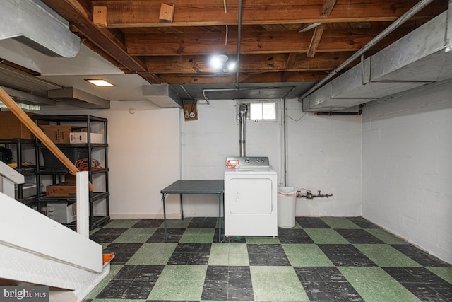 617 March St, Reading, PA 19607 - below grade area with washer / dryer and dark flooring