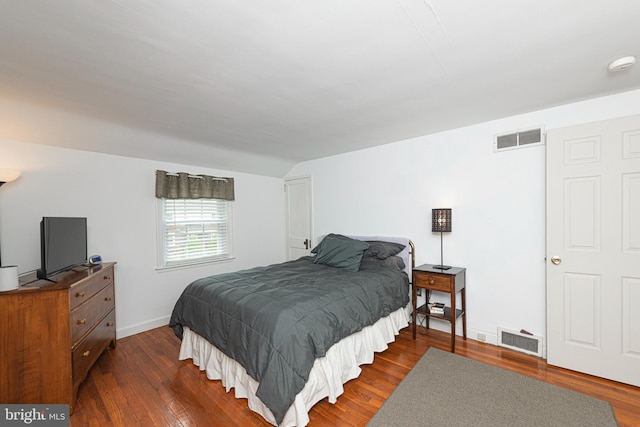 617 March St, Reading, PA 19607 - bedroom featuring dark wood finished floors, baseboards, and vaulted ceiling