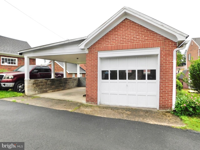 1216 23rd Ave, Altoona, PA 16601 - view of front of home with brick siding and a detached garage