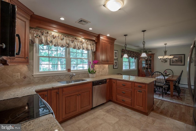 128 Cherry Ln, Doylestown, PA 18901 - kitchen featuring dishwasher, a sink, brown cabinetry, a peninsula, and ornamental molding