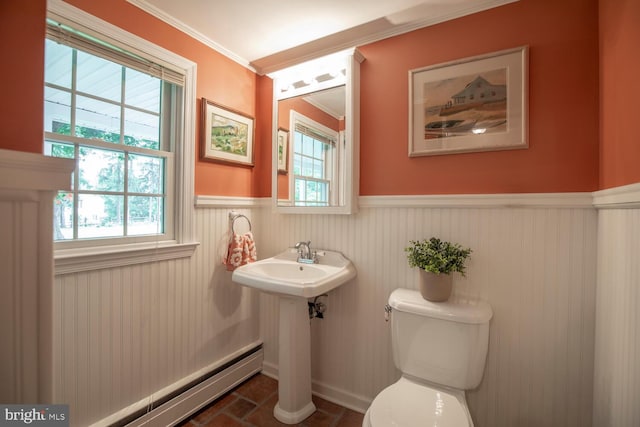 128 Cherry Ln, Doylestown, PA 18901 - half bathroom with a wainscoted wall, toilet, crown molding, a baseboard heating unit, and a sink