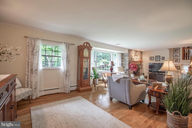 128 Cherry Ln, Doylestown, PA 18901 - living room featuring ornamental molding, light wood-style floors, and a baseboard radiator