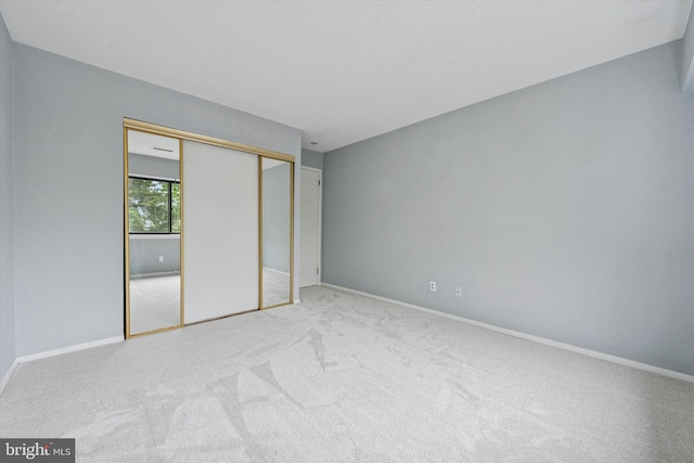 289 Summit House Unit 289, West Chester, PA 19382 - unfurnished bedroom featuring carpet, a closet, and baseboards