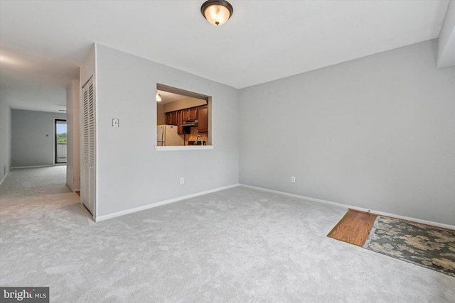 289 Summit House Unit 289, West Chester, PA 19382 - spare room featuring carpet flooring and baseboards