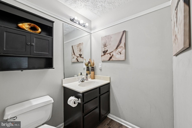8924 Oxley Forest Ct, Laurel, MD 20723 - half bath with a textured ceiling, vanity, and wood finished floors