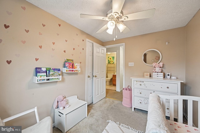 8924 Oxley Forest Ct, Laurel, MD 20723 - carpeted bedroom with a textured ceiling and ceiling fan
