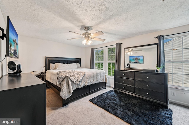 8924 Oxley Forest Ct, Laurel, MD 20723 - bedroom featuring carpet floors, ceiling fan, and a textured ceiling