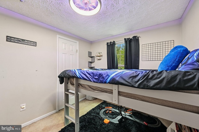 8924 Oxley Forest Ct, Laurel, MD 20723 - carpeted bedroom with baseboards and a textured ceiling