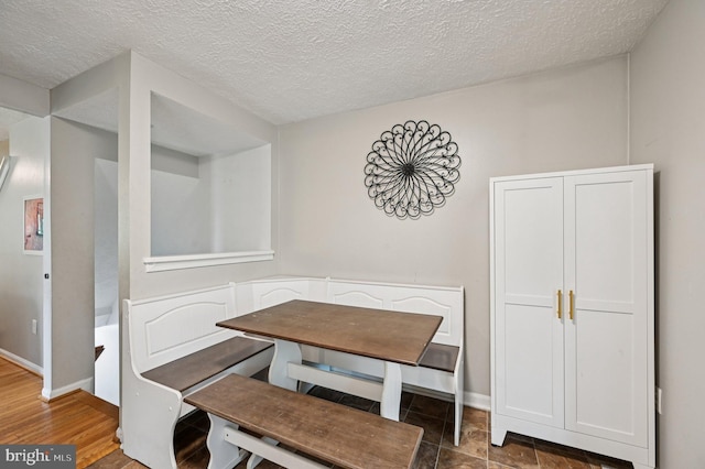 8924 Oxley Forest Ct, Laurel, MD 20723 - unfurnished dining area featuring a textured ceiling
