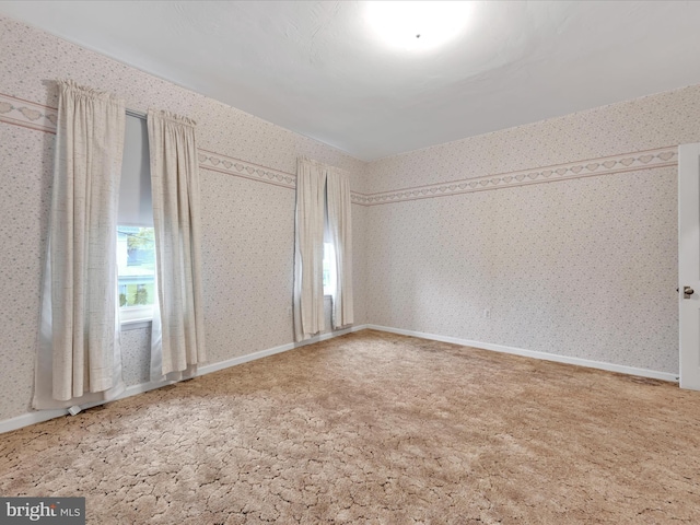16 W Maple Ave, Myerstown, PA 17067 - carpeted empty room with wallpapered walls