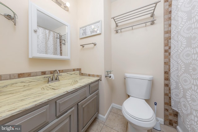 2 Stretch Dr, Mullica Hill, NJ 08062 - bathroom with vanity, toilet, tiled shower, baseboards, and tile patterned floors