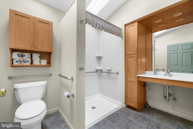 464 E Walnut St, Kutztown, PA 19530 - bathroom featuring toilet, a stall shower, a sink, and baseboards