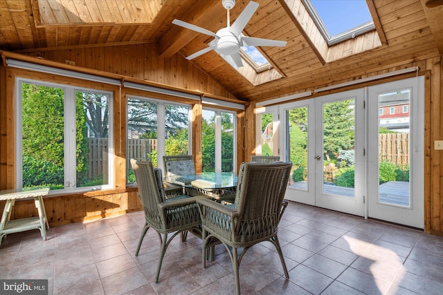 464 E Walnut St, Kutztown, PA 19530 - sunroom featuring french doors, a skylight, lofted ceiling, wood walls, and plenty of natural light