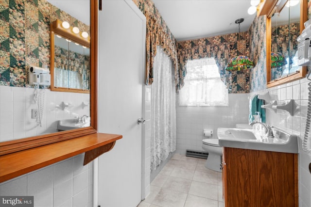 464 E Walnut St, Kutztown, PA 19530 - full bath featuring tile walls, wallpapered walls, tile patterned flooring, toilet, and a wainscoted wall