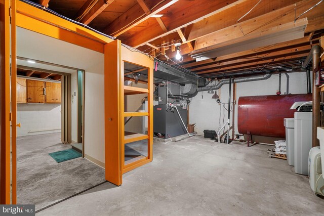 464 E Walnut St, Kutztown, PA 19530 - unfinished below grade area featuring oil tank and heating unit