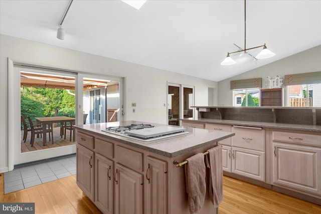 464 E Walnut St, Kutztown, PA 19530 - kitchen featuring gas stovetop, light wood-type flooring, rail lighting, a center island, and healthy amount of natural light