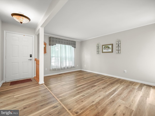 6290 Pinyon Pine Ct, Eldersburg, MD 21784 - entrance foyer with light wood-type flooring and ornamental molding