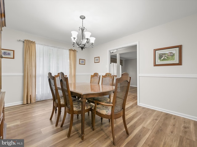 6290 Pinyon Pine Ct, Eldersburg, MD 21784 - dining area featuring a chandelier and light wood-style floors