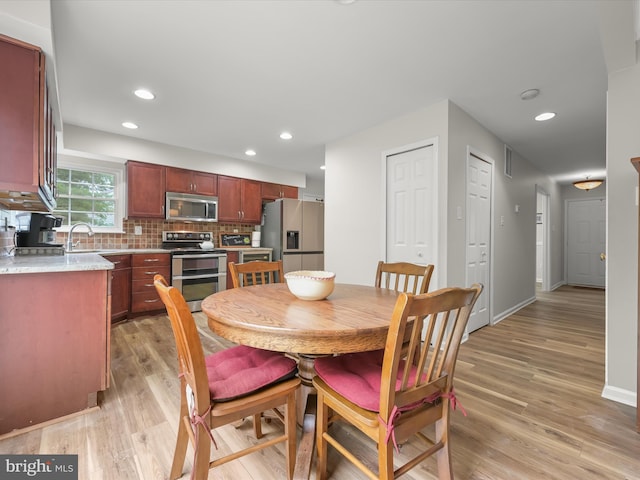 6290 Pinyon Pine Ct, Eldersburg, MD 21784 - dining area with light wood-type flooring and recessed lighting