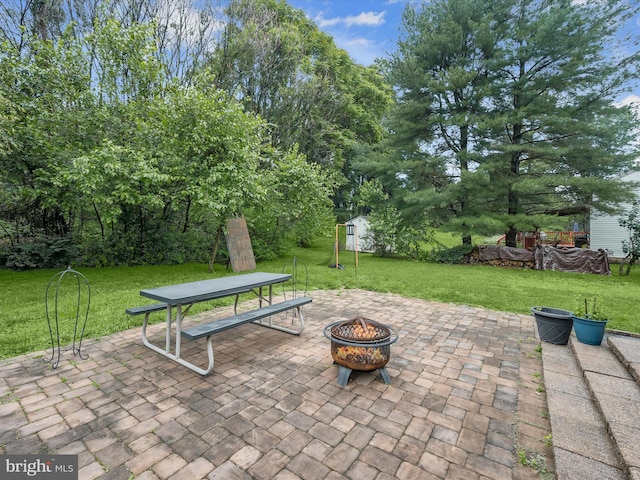 6290 Pinyon Pine Ct, Eldersburg, MD 21784 - view of patio featuring an outdoor fire pit, a storage shed, and outdoor dining space