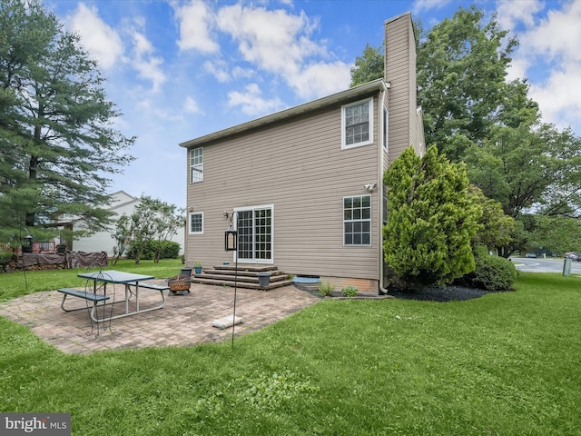 6290 Pinyon Pine Ct, Eldersburg, MD 21784 - back of property featuring a chimney, a yard, and a patio area