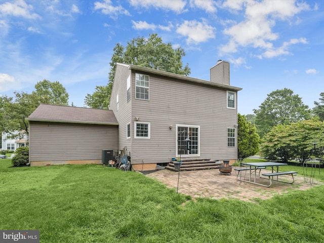6290 Pinyon Pine Ct, Eldersburg, MD 21784 - back of property featuring a yard, a patio area, and a chimney