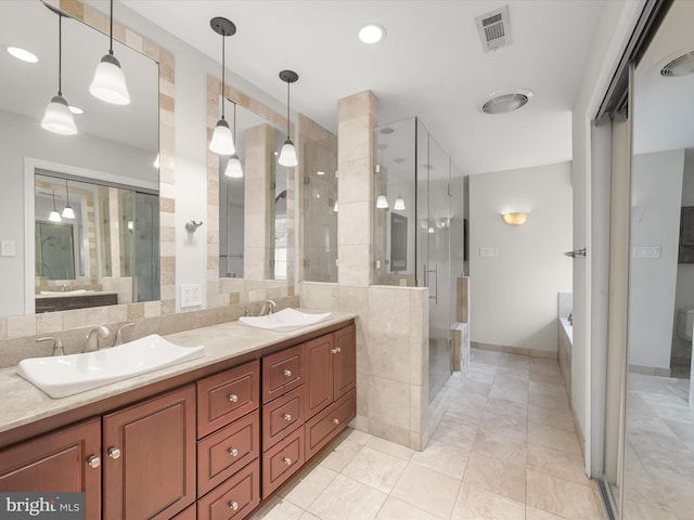 6290 Pinyon Pine Ct, Eldersburg, MD 21784 - bathroom with a stall shower, double vanity, a garden tub, and tile patterned flooring