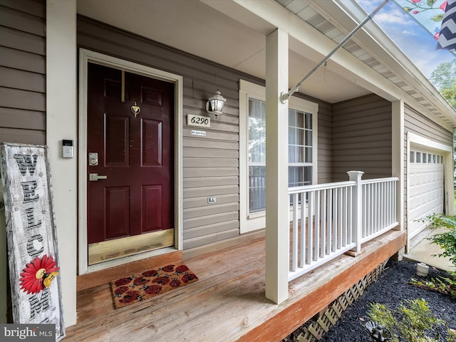 6290 Pinyon Pine Ct, Eldersburg, MD 21784 - entrance to property featuring covered porch and a garage