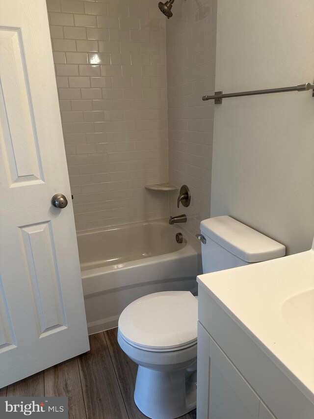 4321 Drake Ct, Waldorf, MD 20603 - full bathroom featuring shower / washtub combination, toilet, vanity, and wood finished floors