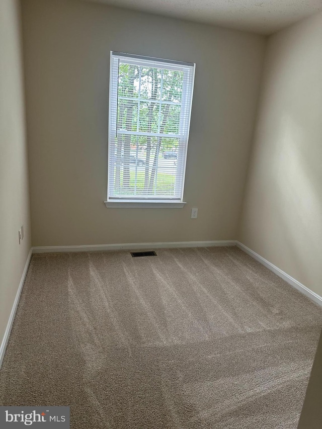4321 Drake Ct, Waldorf, MD 20603 - carpeted empty room featuring baseboards