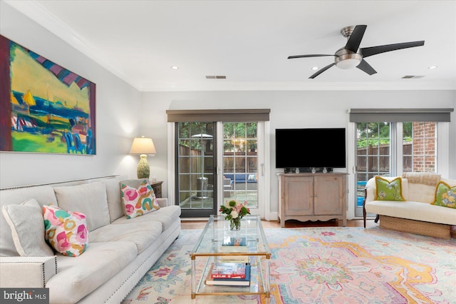 3277 Sutton Pl NW Unit C, Washington, DC 20016 - living area with healthy amount of natural light, a ceiling fan, crown molding, recessed lighting, and wood finished floors