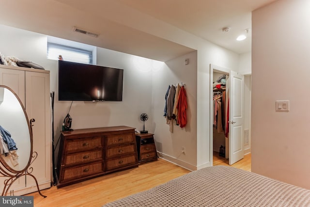 801 N 16th St Unit 1, Philadelphia, PA 19130 - bedroom featuring light wood-style flooring, a spacious closet, baseboards, and a closet