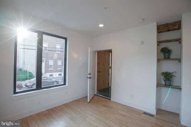 801 N 16th St Unit 1, Philadelphia, PA 19130 - unfurnished room with light wood-type flooring, baseboards, and a smoke detector