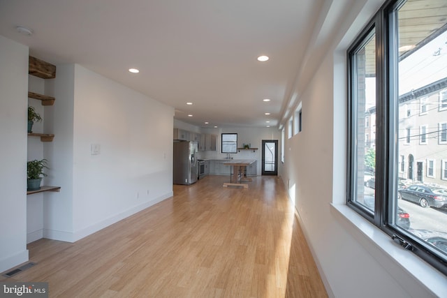 801 N 16th St Unit 1, Philadelphia, PA 19130 - unfurnished living room featuring light wood-style floors, recessed lighting, and baseboards