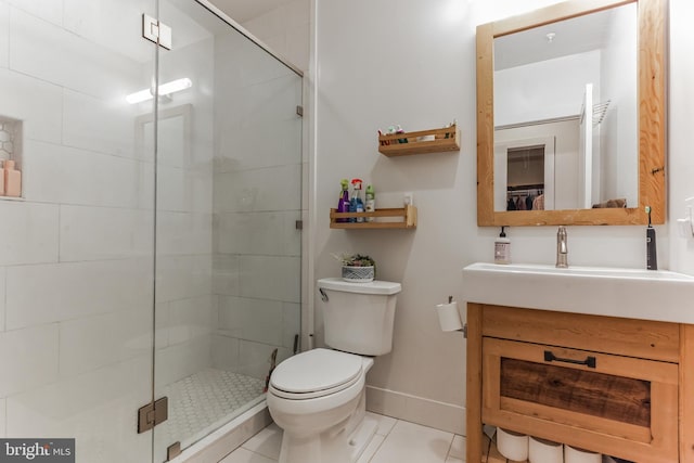 801 N 16th St Unit 1, Philadelphia, PA 19130 - full bath with vanity, toilet, a stall shower, tile patterned flooring, and baseboards