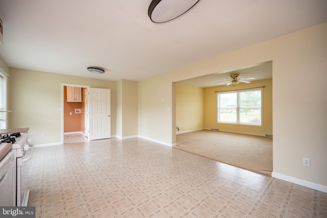 386 Marlin Savage Rd, Accident, MD 21520 - unfurnished living room featuring baseboards, a ceiling fan, and light floors