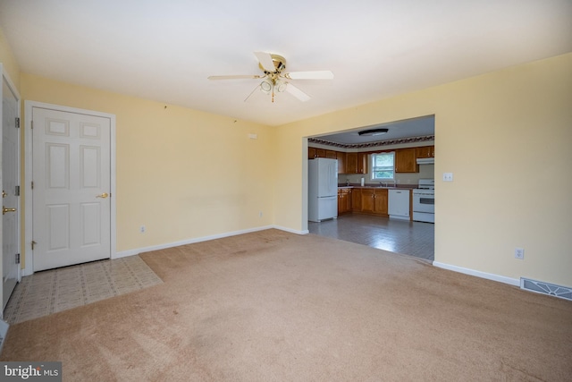 386 Marlin Savage Rd, Accident, MD 21520 - unfurnished living room featuring carpet flooring, baseboards, and a ceiling fan