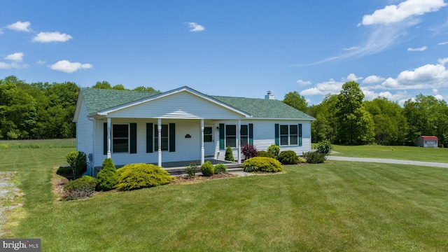 386 Marlin Savage Rd, Accident, MD 21520 - single story home featuring a porch, a front lawn, and a shingled roof