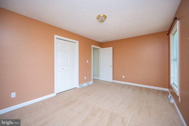 386 Marlin Savage Rd, Accident, MD 21520 - unfurnished bedroom with carpet floors, baseboards, and a closet