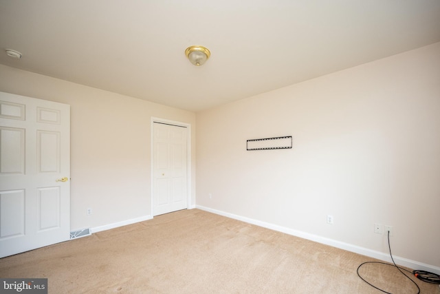 386 Marlin Savage Rd, Accident, MD 21520 - unfurnished bedroom featuring light carpet, baseboards, and a closet