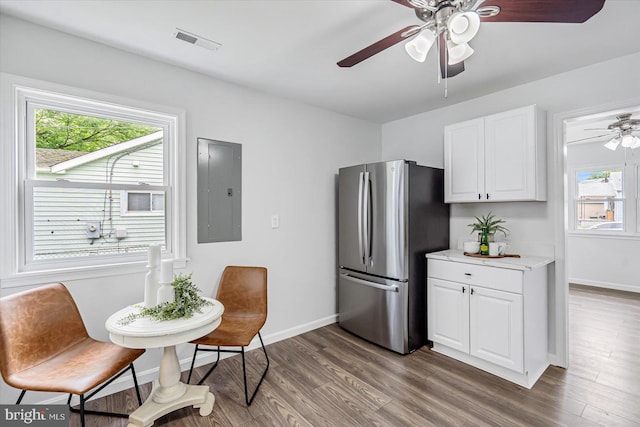 10 Taxi Way, Baltimore, MD 21220 - kitchen with freestanding refrigerator, electric panel, ceiling fan, wood finished floors, and baseboards